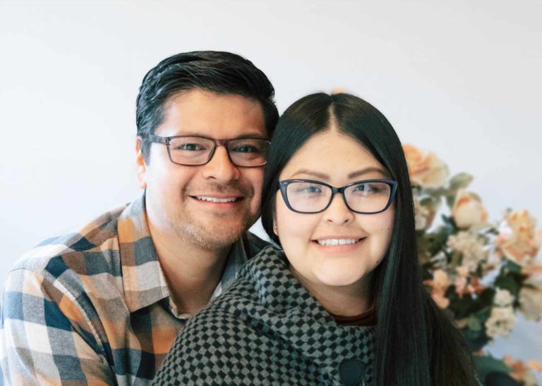 Smiling couple with glasses